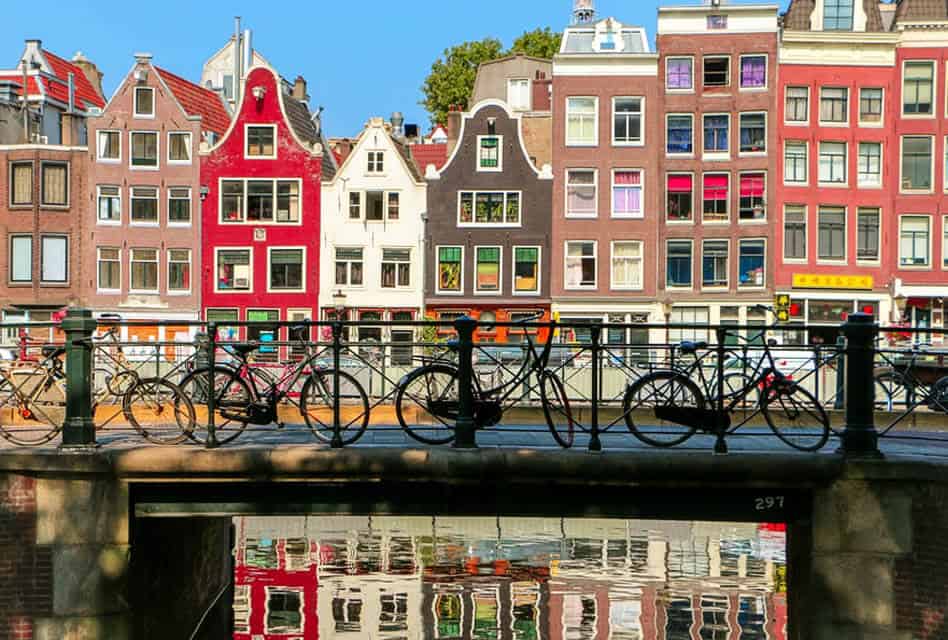bikes on bridge in amsterdam