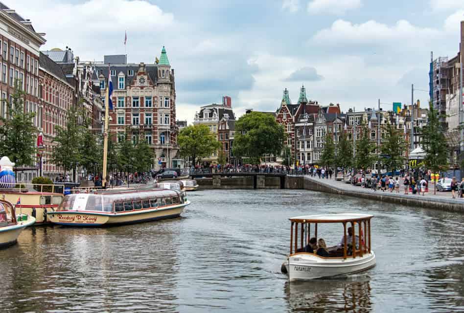 couple on water taxi in amsterdam