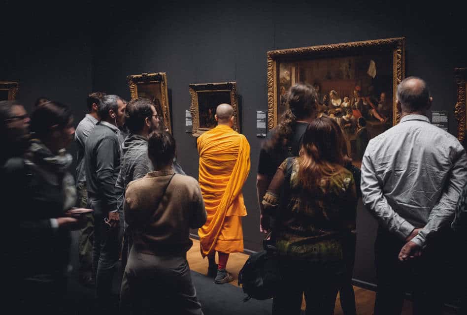 monk-stands-in-museum-amsterdam