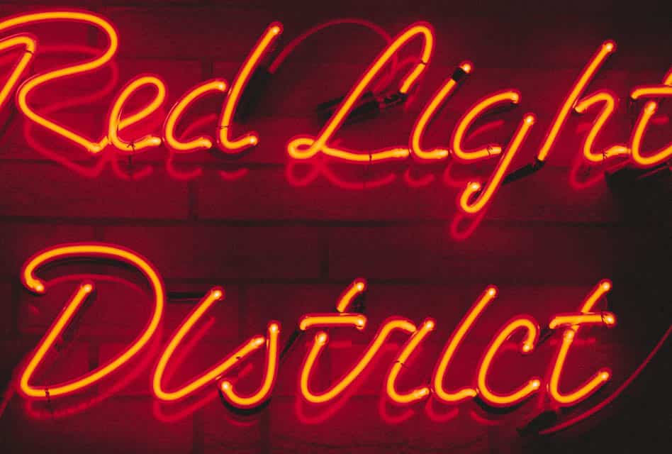 red light district neon sign