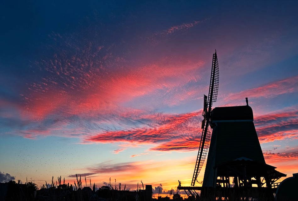 zaanse schans windmill red sky silhouette