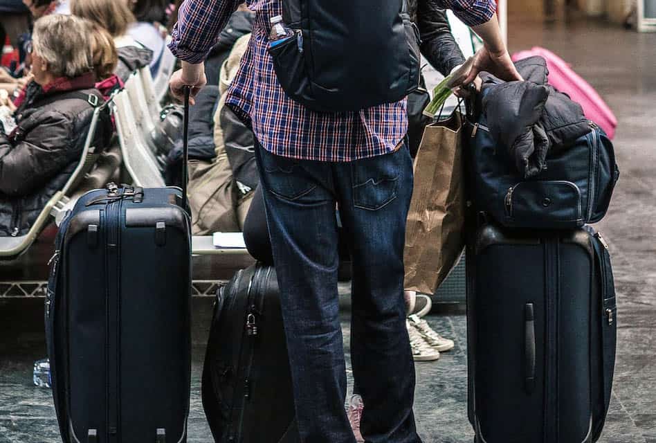 man with lots of luggage