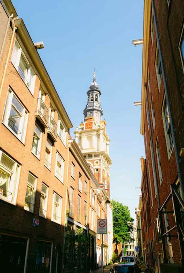 alley near nieuwmarkt area to church steeple